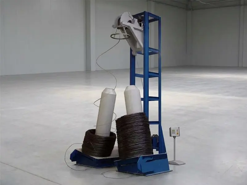 Rotating vertical coil pay-off in operation